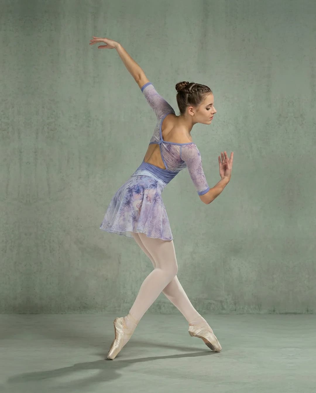Dancer in a pale blue costume